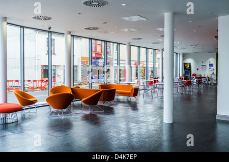 The cafe bar area at Y Ffwrnes, theatre and arts centre, Llanelli, South Wales UK Stock Photo
