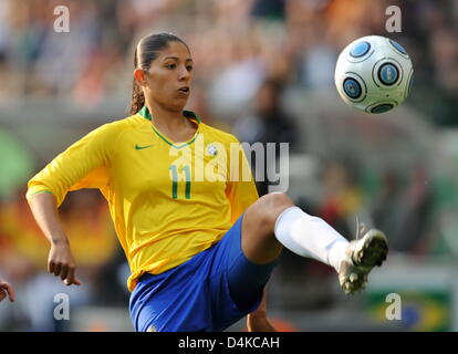 Brazil?s Cristiane controls the ball during the friendly match Germany vs Brazil at Commerzbank Arena stadium in Frankfurt Main, Germany, 22 April 2009. The match that established a new European visitors record for women?s soccer with 44,825 fans ended in a 1-1 draw. Photo: Arne Dedert Stock Photo
