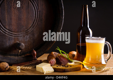 Still life with traditional rustic dinner cold plate and beer Stock Photo