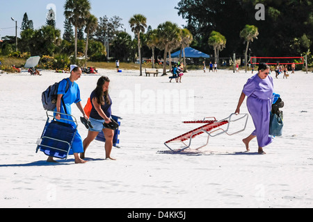 Amish women taking time to chill on Siesta Key beach Florida Stock ...