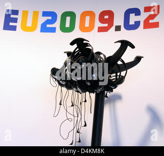 Headphones hang in the conference centre during the EU Eastern Partnership Summit in Prague, Czech Republic, 07 May 2009. The EU summit is to bring the former Soviet states Armenia, Azerbaijan, Georgia, Moldova, Ukraine and Belarus closer to the EU. In return for democratic reforms, the Union offers far-reaching treaties of association, help with the construction of functional stat Stock Photo