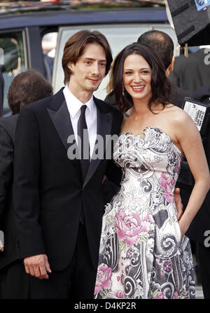 Italian actress and jury member Asia Argento and her husband Michele Civetta arrive for the gala screening of Pixar?s animation film ?Up? that runs out of competition and opens the 62nd Cannes Film Festival in Cannes, France, 13 May 2009. The film festival will take place from 13 til 24 May 2009. Photo: Hubert Boesl Stock Photo