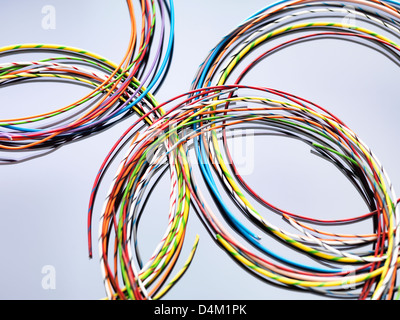 Colorful cables used in electrical and computer communications Stock Photo