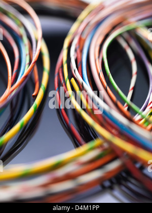 Colorful cables used in electrical and computer communications Stock Photo
