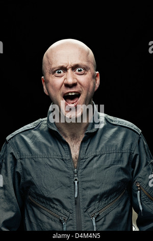 Man gasping indoors Stock Photo