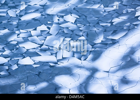 Aerial view of a frozen Red Tarn below Helvellyn in the Lake District. Stock Photo