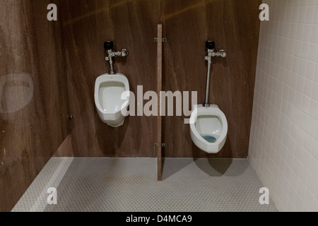 Mens room urinals Stock Photo