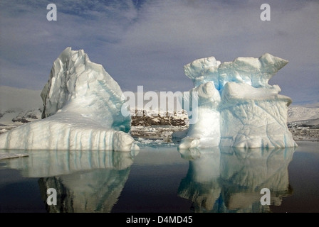 Iceberg Reflections in Paradise Bay, Antarctic Peninsula Stock Photo