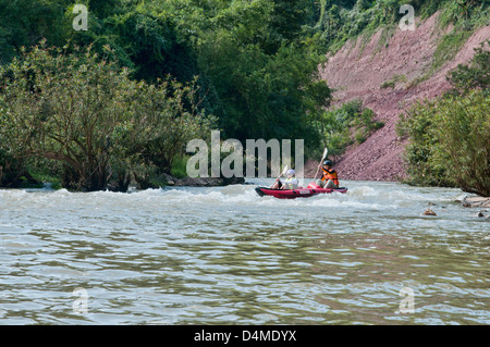 kayaking the Nam Ha River in Nam Ha Protected Area, Luang Nam Tha, Laos Stock Photo