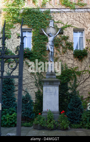 Opole, Poland, Jesus sculpture in the courtyard of a shelter for the homeless Stock Photo