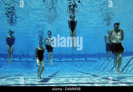 US Olympic Team triathletes perform down proofing exercises during a day of training with Navy SEALs at the Naval Special Warfare Center March 16, 2005 in San Diego, CA. Stock Photo