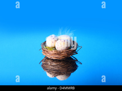 three easter eggs in a small nest Stock Photo