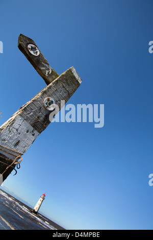 The Wales Coastal Path in North Wales. Close up angled view of a path signpost on Talacre beach. Stock Photo