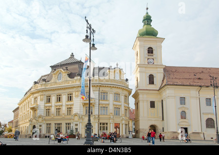 City Hall, left, baroque Jesuit Church, right, Main Square, Sibiu, Transylvania, Romania, Europe Stock Photo