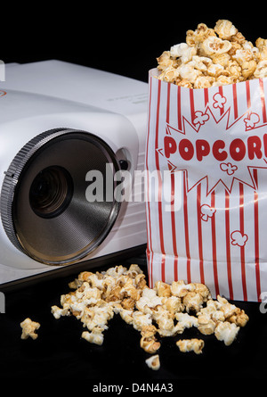 Home Cinema projector with fresh made Popcorn Stock Photo