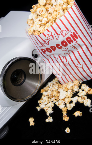 Home Cinema projector with fresh made Popcorn Stock Photo