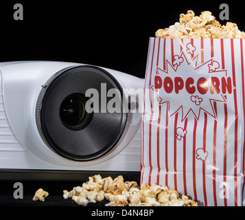 Home Cinema projector with fresh made Popcorn Stock Photo