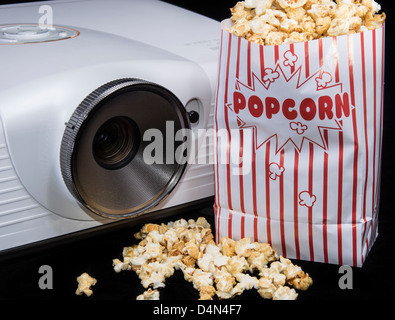 Home Cinema projector with fresh made Popcorn Stock Photo