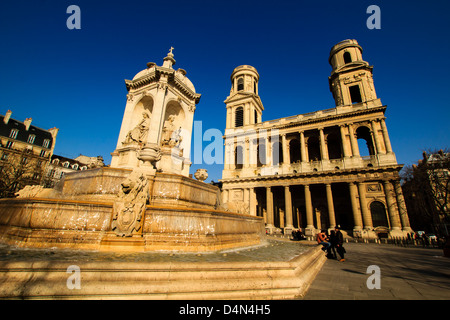 Saint Sulpice square with it's fountain and cathedral, the stage place of the 'The Da Vinci Code' of Dan Brown, Paris, France Stock Photo