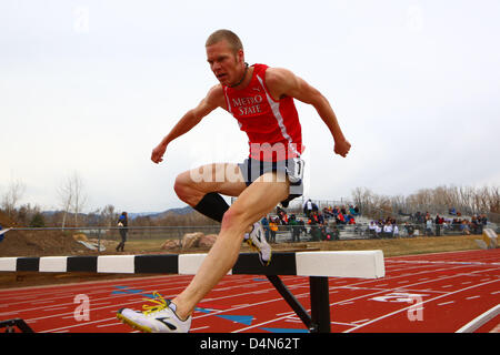 March 16, 2013 - Boulder, CO, United States of America - March 16, 2013: Metropolitan State's Eiger Erickson competes in the steeple chase at the inaugural Jerry Quiller Classic at the University of Colorado campus in Boulder. Erickson won the event. Stock Photo