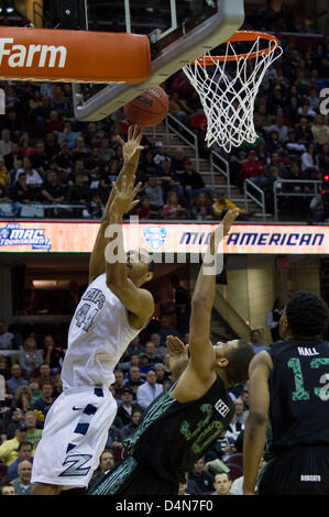 March 16, 2013: Zeke Marshall (44) of Akron shoots over Reggie Keely (30) during the MAC Tournament Championship game. Akron beat Ohio 65-46 at Quicken Loans Arena in Cleveland, OH. Stock Photo