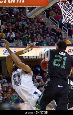 March 16, 2013: Akron's Zeke Marshall (44) is fouled by Jon Smith (21) of Ohio during the MAC Tournament Championship game. Akron beat Ohio 65-46 at Quicken Loans Arena in Cleveland, OH. Stock Photo