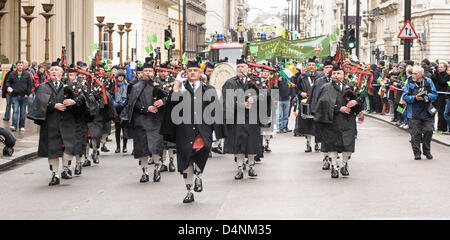 Essex Caledonian Pipe Band march on the St Patrick's Day Parade on 17/03/2013 at Westminster, London. The parade set off from Piccadilly by Green Park at 12 noon and traveled to Whitehall. Picture by Julie Edwards Stock Photo