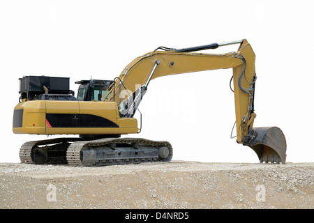 outdoor shot of a yellow resting digger in fade out background Stock Photo