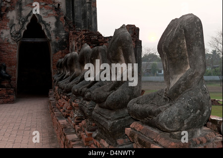 Ayutthaya, Thailand, stone figures without heads in Chaiwatthanaram temple Stock Photo