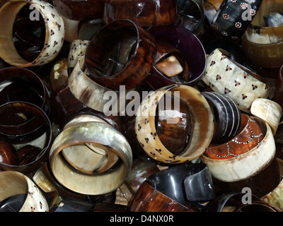 full frame abstract background with lots of various bracelets made of horn Stock Photo
