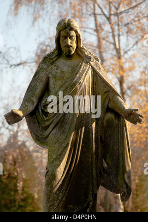 Berlin, Germany, Jesus figure on a grave in the cemetery at Suedstern Stock Photo