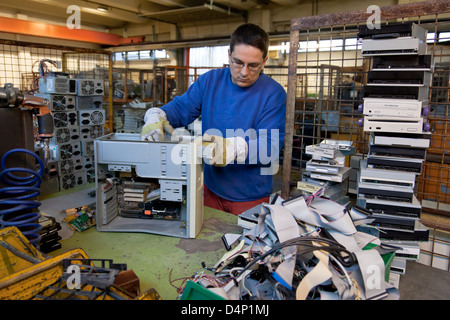 Berlin, Germany, the employee BRAL splits a computer into parts Stock Photo