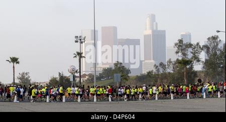 March 17, 2013 - Los Angeles, California (CA, USA - Runners start the 28th Asics LA Marathon in Los Angeles, California Sunday, March 17, 2013. About 24,000 runners from all 50 states and 61 nations participated the 26.2-mile event began at Los Angeles Dodger Stadium and went through Los Angeles, West Hollywood and Beverly Hills and ended in Santa Monica. (Credit Image: © Ringo Chiu/ZUMAPRESS.com) Stock Photo