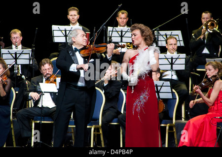 Conductor Peter Guth, singer Monica Mosser and Strauss Festival Orchestra Vienna in concert Crocus City Hall. Moscow -2010.11.17 Stock Photo