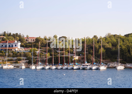 Cephalonia, Greece: Flotilla of yachts moored at the fishing port of Fiskardo in the north of Kefalonia Stock Photo