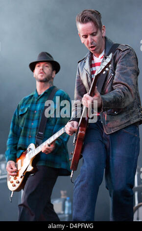 US punk band Social Distortion with lead singer Mike Ness (L) and guitarist Dennis Dannell performs at the 13th Hurricane festival in Scheessel, Germany, 20 June 2009. Some 70 bands will perform three days to some 60,000 visitors expected. Photo: FRISO GENTSCH Stock Photo