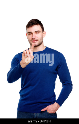 Man dressed casually pointing forwards isolated on a white background Stock Photo