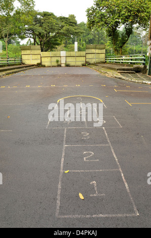 Hopscotch grid points to gate Stock Photo