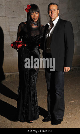 British topmodel Naomi Campbell (L) and Vladimir Doronin arrive for the wedding reception of Barbara Becker in Potsdam, Germany, 12 September 2009. Barbara Becker and Arne Quinze got married on 09 September. Photo: JENS KALAENE Stock Photo