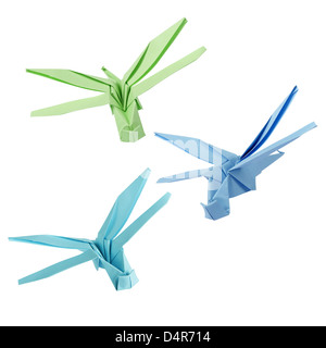 Origami dragonfly in flight isolated on a white background Stock Photo