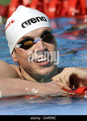 German swimmer Paul Biedermann seen after his heat of the men?s 400m freestyle competition at the FINA Swimming World Championships in Rome, Italy, 26 July 2009. Biedermann finished his heat first with a new European record of 3:43,01 and qualified for the final. Photo: Bernd Thissen Stock Photo