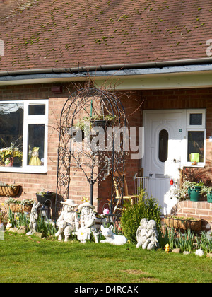 Private house with garden ornaments in Sandbach Cheshire UK Stock Photo