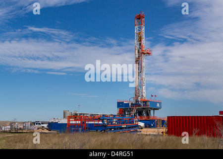 An exploratory oil well drilling rig near Peggy, Texas, USA. Stock Photo