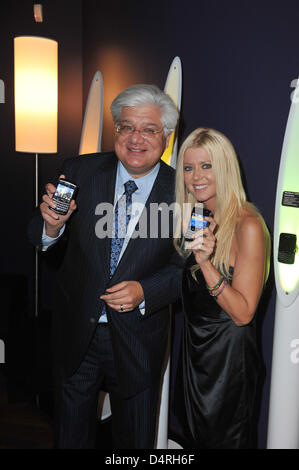 Mike Lazaridis, BlackBerry inventor, and actress Tara Reid attend the BlackBerry launch party at Kameha Suite in Cologne, Germany, 21October 2009. Canadian inventor and producer Research In Motion® (RIM) started to further develop smartphones in Germany one year ago. The BlackBerry smartphones ?developed in Germany? were celebrated at the party. Photo: Joerg Carstensen Stock Photo