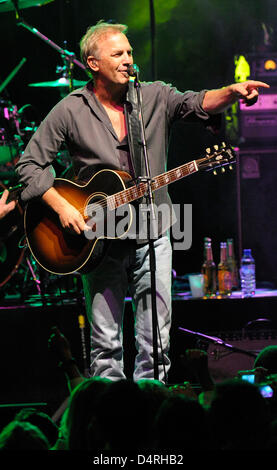 US actor Kevin Costner performs at the congress centre ?Rosengarten? in Mannheim, Germany, 22 October 2009. He presented the new album ?Untold Truths? with his band Modern West. The 54-year-old sings about American country life. Photo: Ronald Wittek Stock Photo