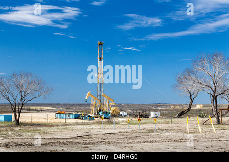 An exploratory oil well drilling rig near Peggy, Texas, USA. Stock Photo