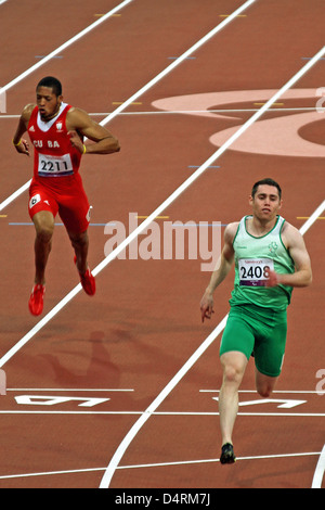 Jason Smyth of Ireland celebrates gold in the mens 100m - T13 in the Olympic stadium at the London 2012 Paralympic games. Stock Photo