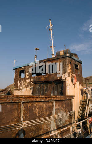 Burned and rusted boat Stock Photo
