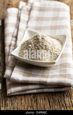 the wholemeal flour in ceramic bowl Stock Photo