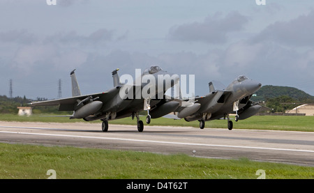 Two F-15's from the 18th Wing come in for a formation landing at Kadena Air Base, Okinawa, Japan. Stock Photo